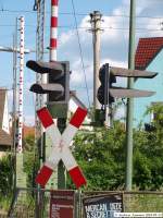 Bahnubergange Lichtsignalanlage und Schranke(n) am Bahn�bergang Sch�tzenstra�e in Wendlingen am Neckar. (23,05,2010)