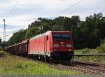 185 387-8 fhrt mit einem Holzzug in Richtung Mnchen bei Ebersbach/Fils. (26,08,2010)