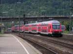 143 105-5 fhrt mit seinem RE aus Tbingen kommend nach kurzem Halt in Plochingen weiter nach Stuttgart Hbf.