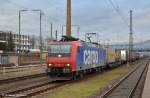 482 027 mit Container ...  Andreas Axmann 16.12.2011
