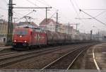 kessel--und-silozuge 185 606 der HGK ziehen einen KeWa durch Esslingen/N in Richtung Stuttgart. (17,03,2011)