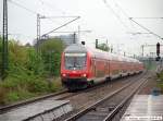 re 18:45 / In Schrittgeschwindigkeit f�hrt RE 91713 mit 146 215-9 am Gleis 4 durch den Bf Untert�rkheim nach Neu-Ulm. (01,05,2010)