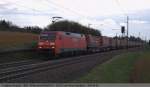 sattelauflieger-klv Es Dunkelt langsam, als 152 115 mit dem Winner-Zug durch Ebersbach/Fils in Richtung Stuttgart f�hrt. (30,03,2011)