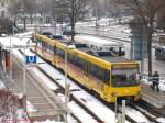 Stadtbahn Stuttgart DUEWAG DT8.4 3041 mit Werbung f�r Wilhelma Zoologischer Garten an der Haltestelle Untert�rkheimer Bf um 15:47 Uhr als U13 nach Hedelfingen. (17,02,2010)