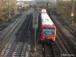 Von Rechts kommend auf der KBS760 aus Tübingen RB22924 mit 650 016-9 und 650 ? und von Links auf der KBS750 aus Ulm RE19304 mit 146 222-5 in den Plochinger Bahnhof einfahrend am 26.11.2008