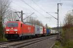 185 307 mit kurzem Container-Zug durch Uhingen in Richtung Stuttgart/Kornwestheim. (25,04,2012)
