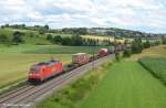 185 233 mit KLV-Zug durch Uhingen in Richtung Stuttgart/Kornwestheim. (08,07,2012)