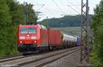 185 163 mit Güterzug durch Uhingen in Richtung Stuttgart/Kornwestheim.