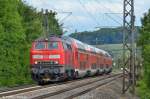 kbs-750-filsbahn/213563/218-409-und-218-427-mit 218 409 und 218 427 mit IRE 4244 durch Uhingen nach Stuttgart. (07,08,2012)