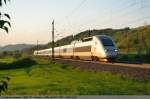 4404 auf dem Weg als TGV 9585 von Paris Est nach München bei Kuchen/Fils. (22,04,2011)